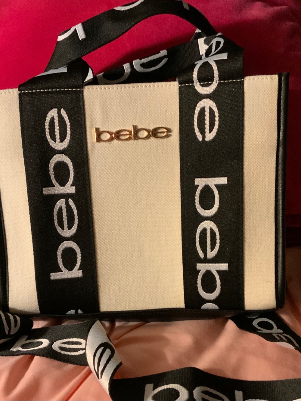 bebe Canvas Logo Tote in Cream with Black Straps and Gold Logo